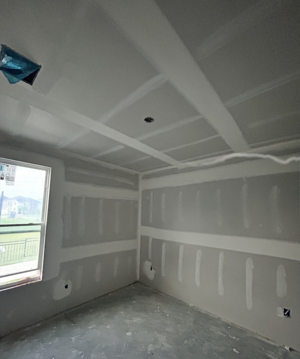 Drywall taped and prepared for finish